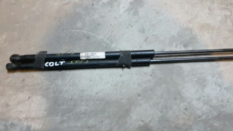 Амортизатор задней двери  Mitsubishi Colt Z2 4G19