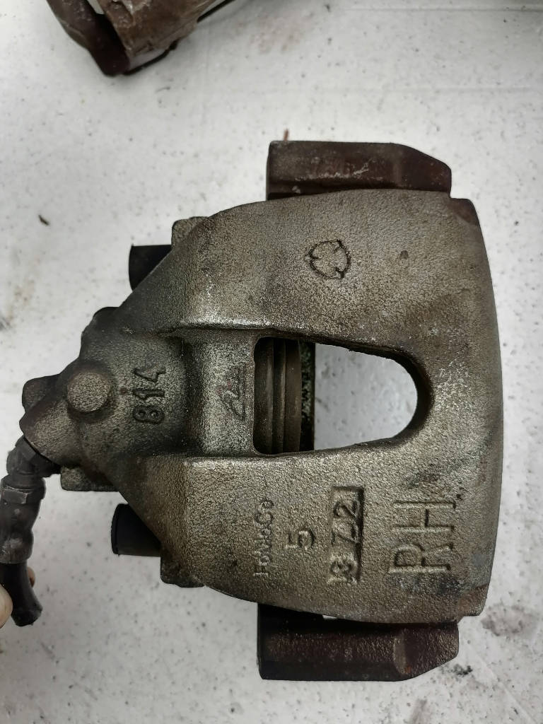 Суппорт тормозной правый передний Mazda Axela 2004 BKEP LFVE