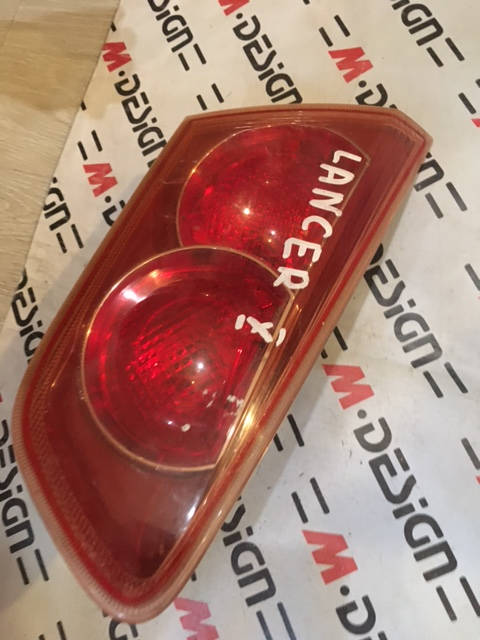 Фонарь задний Левый Mitsubishi Lancer 10 8337A009