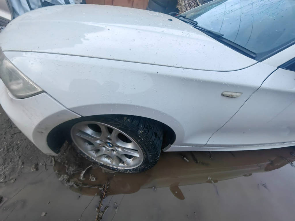 Переднее крыло BMW E87