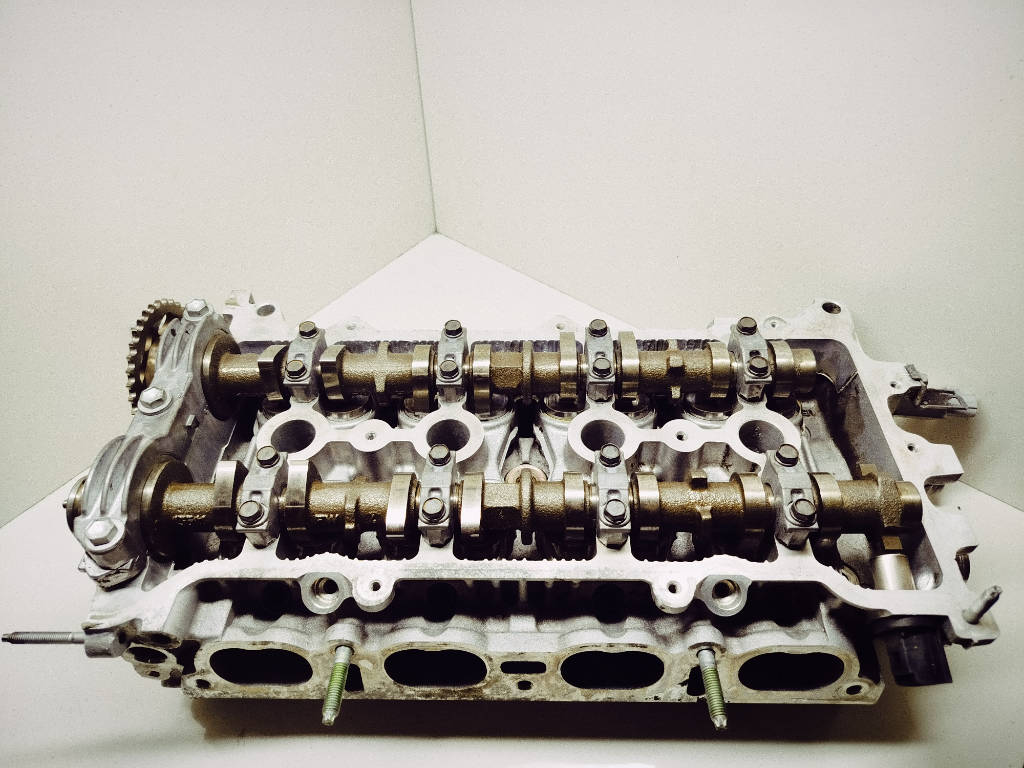 Головка блока цилиндров 1110122101 Toyota Corolla Fielder 1ZZFE