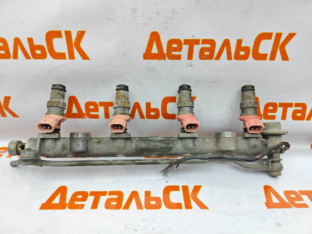 Форсунка 23209-11050 Toyota Corolla EE101 4EFE