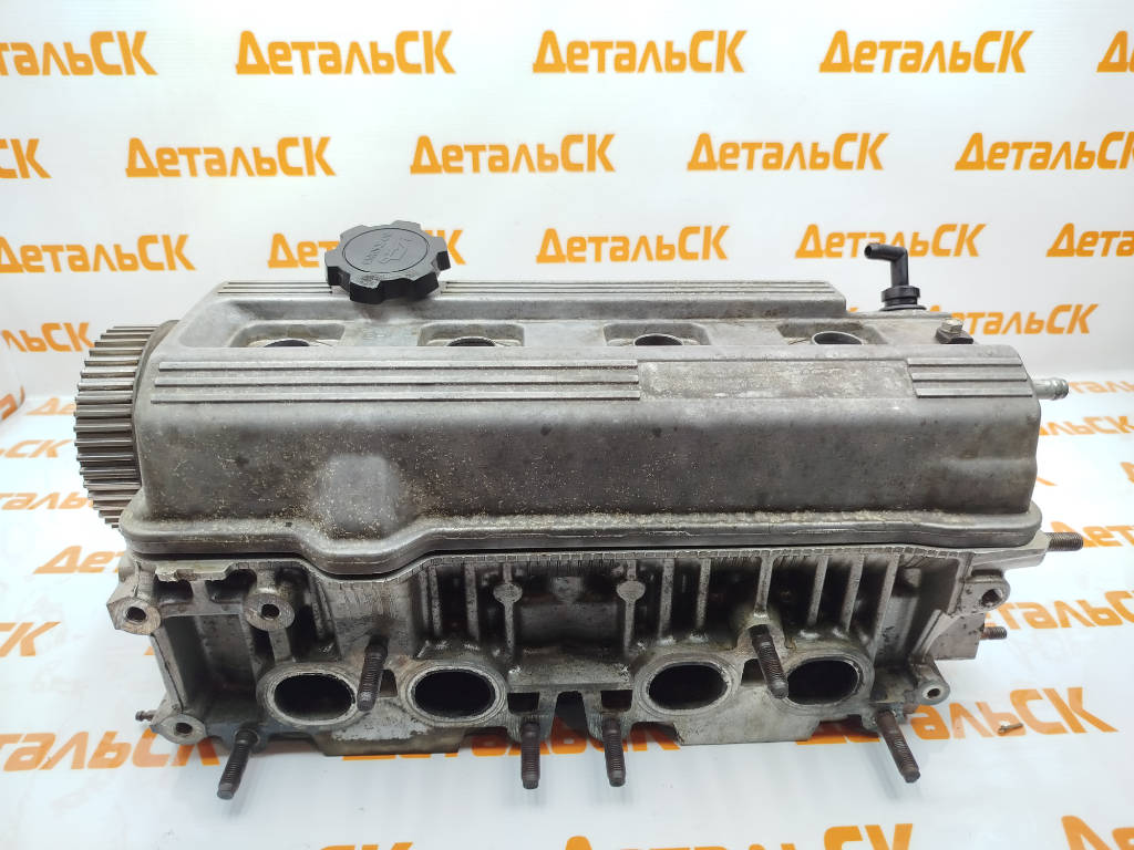 Головка блока цилиндров 1110174900 Toyota Carina ED ST182 3SFE