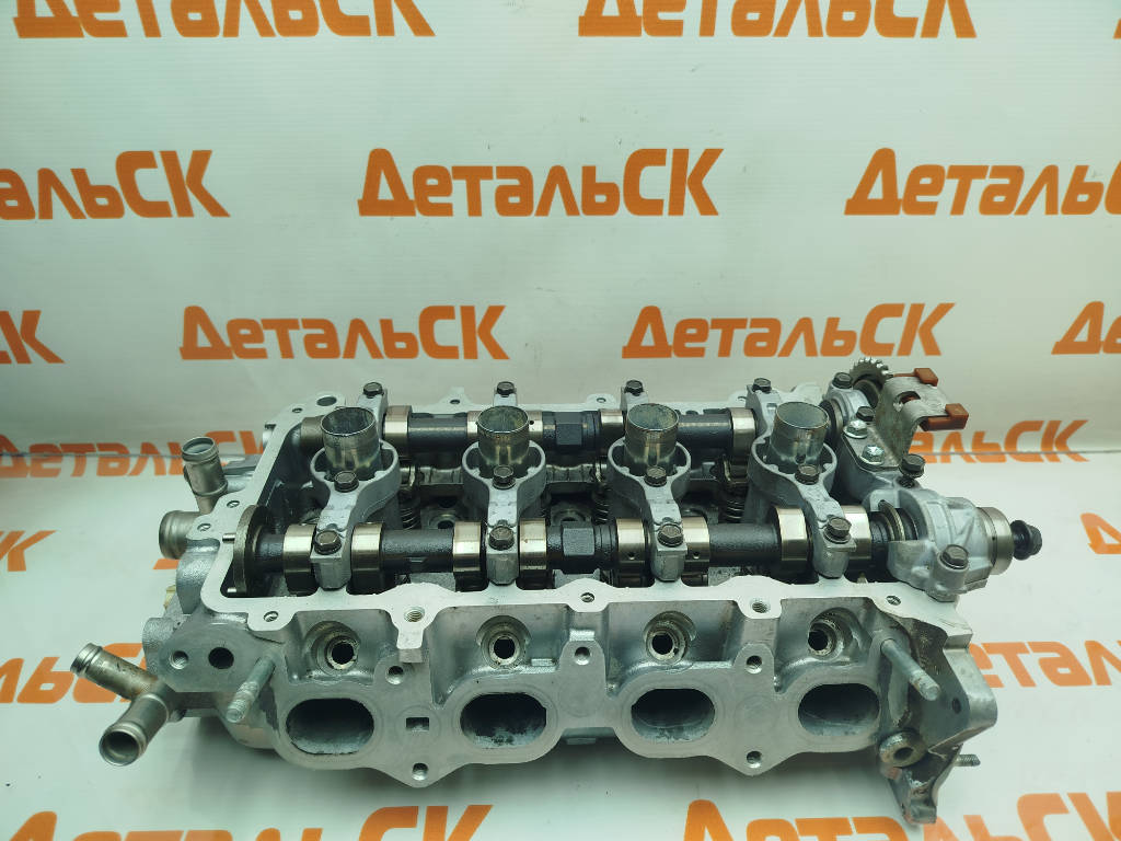 Головка блока цилиндров 11101-23080 Toyota Vitz SCP90 2SZFE
