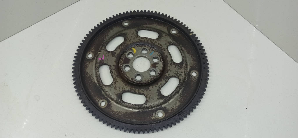 Маховик 3210197401 Toyota Passo 1KRFE
