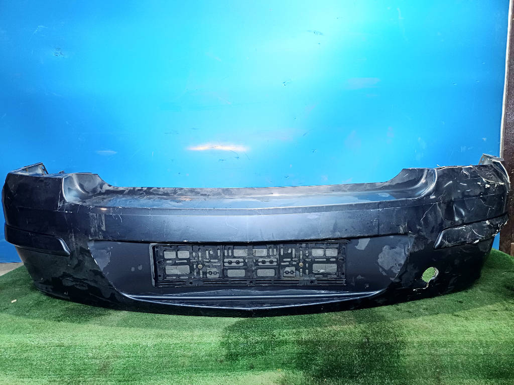 Бампер задний (седан) дефект Opel Astra H (2004-2014)