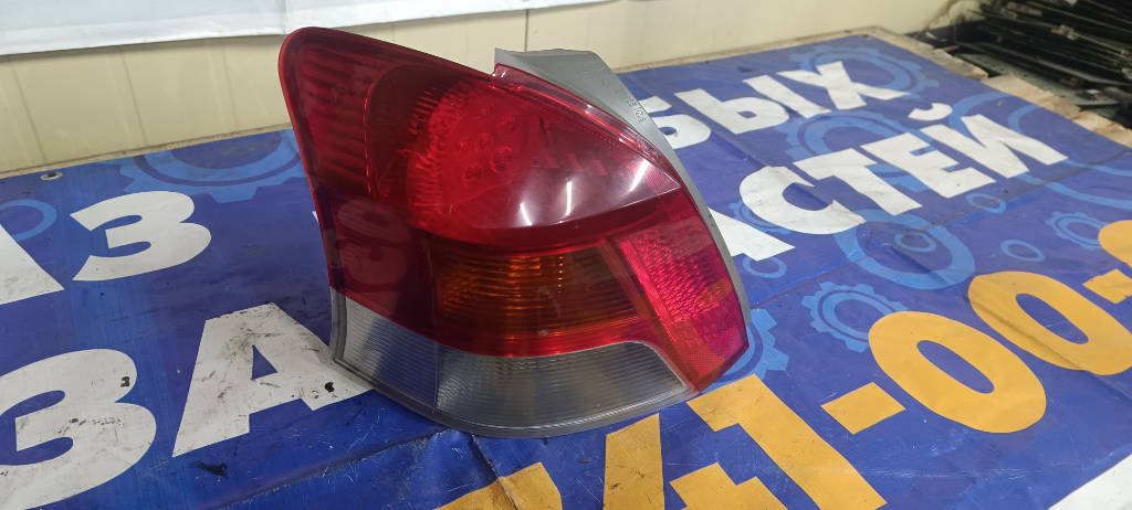 Стоп-сигнал левый 8156052630 Toyota Vitz 2010 KSP90 1KRFE