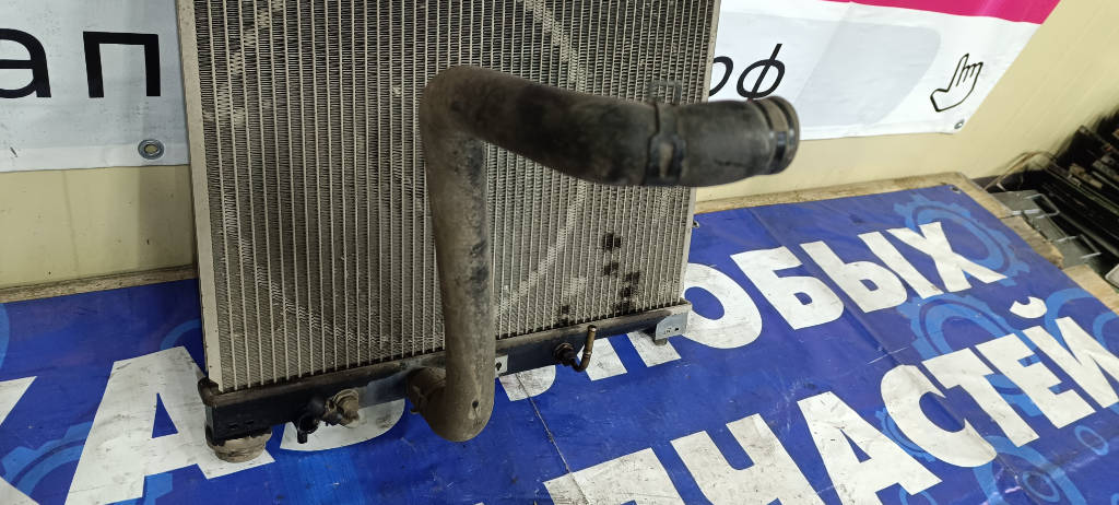 Патрубок радиатора 1657223020 Toyota Platz 2000 SCP11 1SZFE