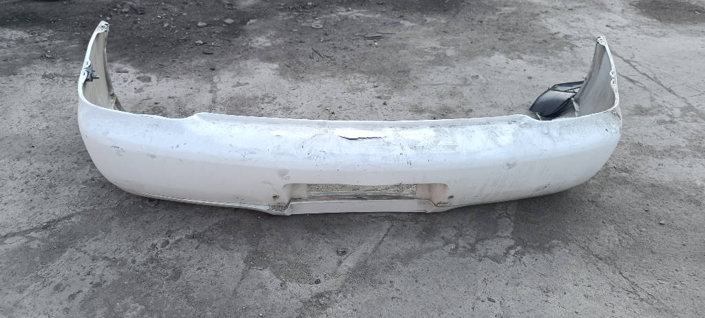 Бампер задний Toyota Platz 2000 SCP11 1SZFE