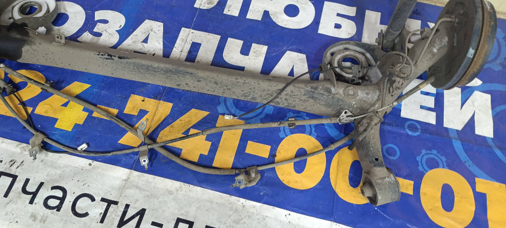 Тросик ручного тормоза левый Toyota Vitz 2010 KSP90 1KRFE